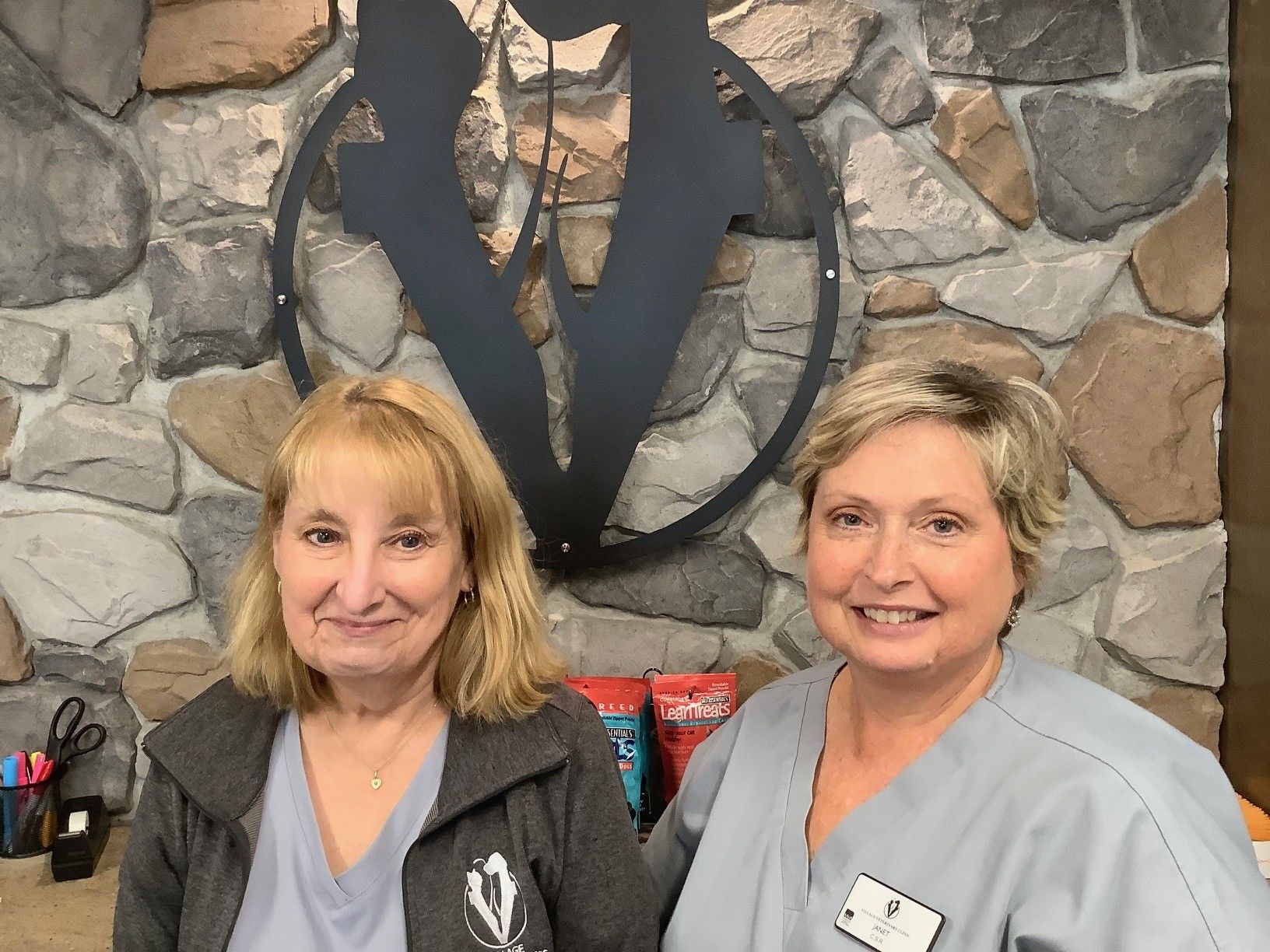 Four receptionists working in the front desk